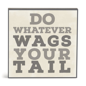 A square cream wall art with the saying "Do whatever wags your tail".