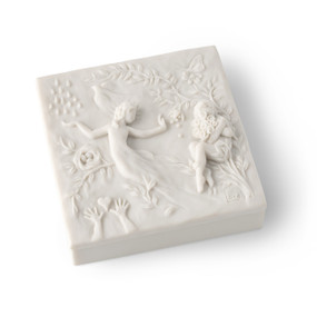 Closed white resin box; lid carved with figural and organic imagery
