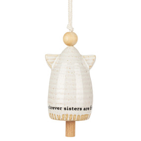 A small cream ceramic angel shaped bell with small wings and a wood bead for the head. The saying "sisters are forever" goes around the base.