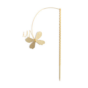 A gold floral pick with a gold metal butterfly hanging from the end.