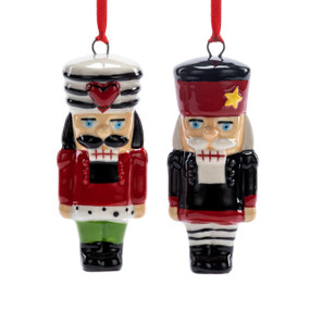 A set of two different nutcracker mini ornaments.