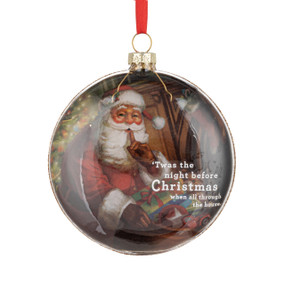 A glass disc ornament with a classic image of Santa and the first line of 'Twas the night before Christmas.