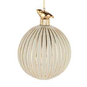 A round ribbed white ornament with gold edges and a small gold bird at the top.