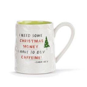 A white ceramic mug with a crinkly appearance. The interior is light green and the saying "I need some Christmas money. I have to buy caffeine!" is on the front.