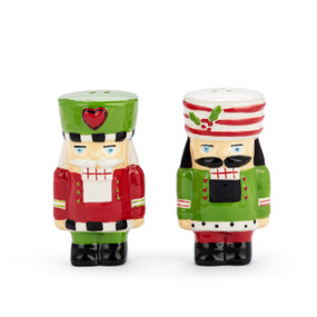 A set of red and green ceramic nutcracker shaped salt and pepper shakers.