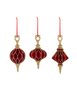 Three different red and gold paper finial ornaments.