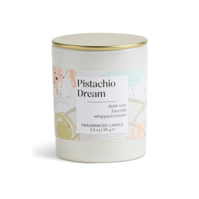 A 3.5 oz pistachio dream scented candle in a round white container with a gold lid.