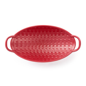 Top down view of a woven melamine red bread basket with handles on the ends.