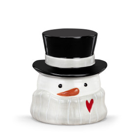 A white ceramic candy jar shaped like the face of a snowman wrapped in a scarf and wearing a black top hat.