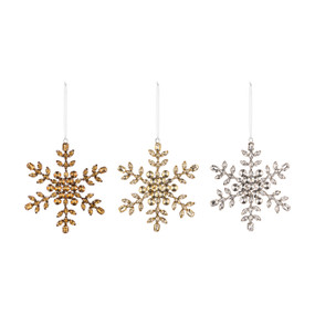 A set of three snowflake ornaments in different shades of gold glitter.