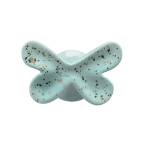 A blue ceramic butterfly shaped wall hook speckled with gold.