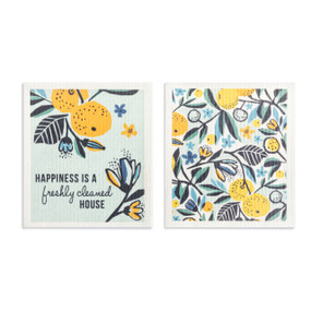 A set of two white biodegradable dish cloths with an orange and green citrus illustration and the saying "Happiness is a freshly cleaned home".