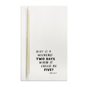 A white kitchen towel with the saying "Why is a weekend two days when it could be five" displayed laid out flat.