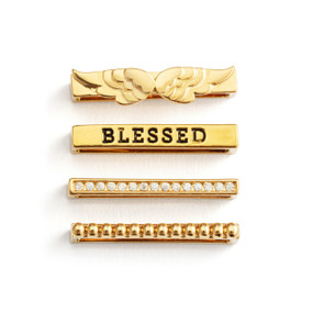 Four different gold charms that fit on a smart watch band. One has the word "Blessed" and another has angel wings.