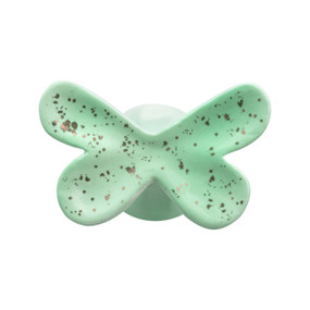 A light green ceramic butterfly shaped wall hook speckled with gold.