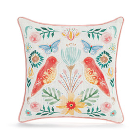 A white square decorative pillow with illustrated coral color birds and other pastel floral accents.