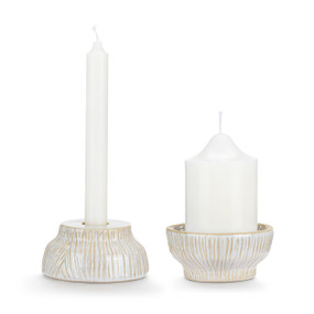 A cream ceramic taper candle holder with a wood grain appearance.
