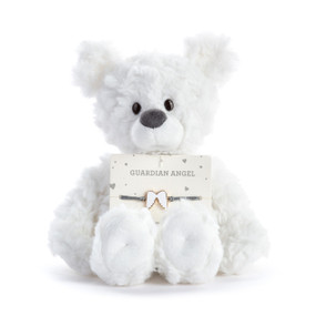 A white plush teddy bear with an attached guardian angel bracelet with two white wings intended for a child.