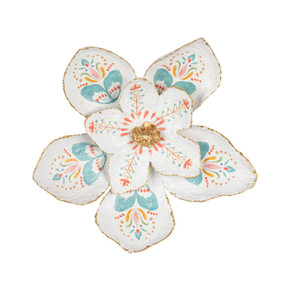 A white paper mache flower with painted petals and gold edges.
