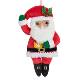 A fabric ornament of Santa Claus holding a yellow mug.