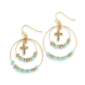 A pair of multi hoop gold earrings with turquoise and gold beads on the hoops and a gold cross charm in the middle.