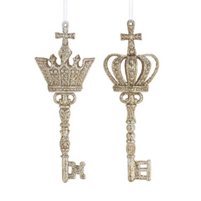 Two gold sparkly ornate different keys with crowns and crosses at the top.