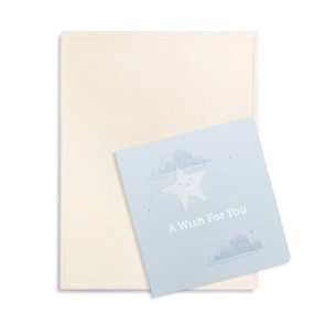A gift set including a cream blanket and a gift book with the title "A Wish for You".