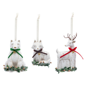 Three different white paper pulp ornaments including a bear, a deer and a fox each with a different colored ribbon around their necks.