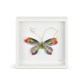 A multi colored butterfly with gold wire tentacles in a white square framed wall art.