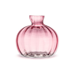 A small clear pink glass vase shaped like a pumpkin.