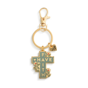 A gold keychain with two charms. One is a small gold heart and the other is a cross and has the saying "Have Faith".