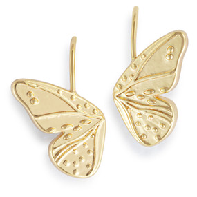 A set of earrings with a gold decorative butterfly wing on each.