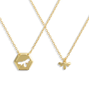 A set of sharing gold chain necklaces with nesting bee charms.