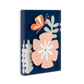 A dark blue acrylic wall art tile with an illustrated peach flower and orange butterfly displayed angled to the right.