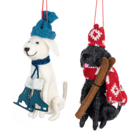 Two different felt labrador retriever dog ornaments. One has ice skates and the other has skis.
