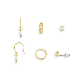 Three different small earring sets in cream and gold with three different types of closures.