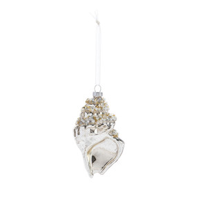 A silver glass conch shell shaped ornament decorated with gold and white beads.