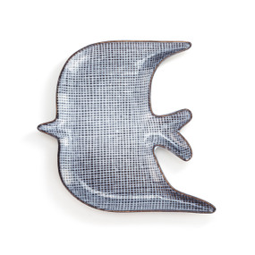 A textured blue and white dove shaped dish.