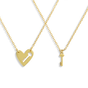 A set of sharing gold chain necklaces with nesting key charms.