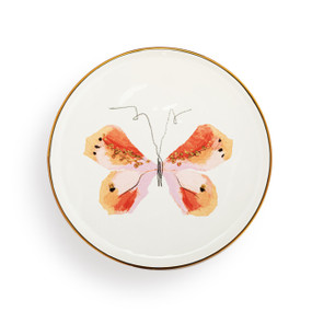 A white ceramic plate with a gold rim and pink and orange butterfly artwork. There is a keyhole on the back for hanging.