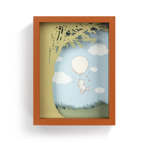 A brown shadow box frame with a classic image of Winnie the Pooh floating away with a balloon.