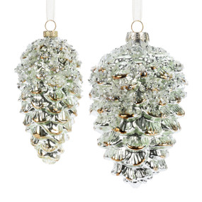 Two sparkly light gold pinecone shaped ornaments decorated with beads.