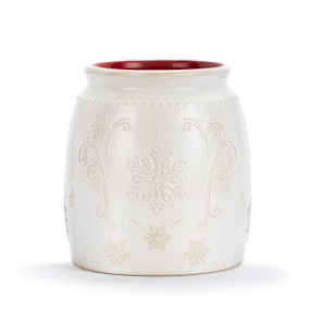 A white ceramic round utensil holder with white relief snowflakes and a red interior.