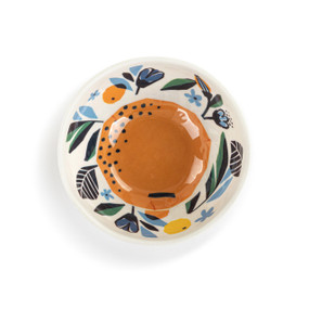 A white bamboo melamine bowl with a citrus illustration inside the bowl.