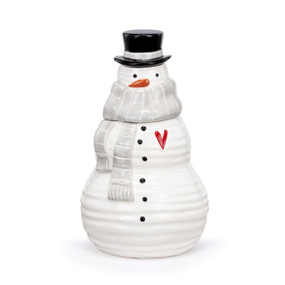 A white ceramic cookie jar shaped like a snowman with a gray scarf, black top hat and red heart.