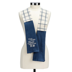 A white and blue plaid fabric kitchen boa with blue towel ends. There is embroidery that says "Mom's Kitchen best cooking ever".