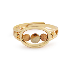 An adjustable gold fidget ring with three beads in the center that spin around.