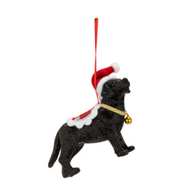 A sculpted ornament of a black labrador wearing a santa hat and a gold bell around its neck.