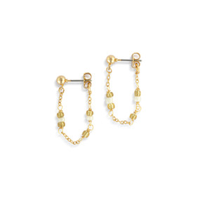 A pair of white and gold beaded loop earrings.