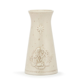 A cream ceramic vase with a sculpted image of the holy family and the guiding star.